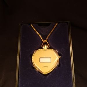 1970s J Carpentier heart digital watch pendant